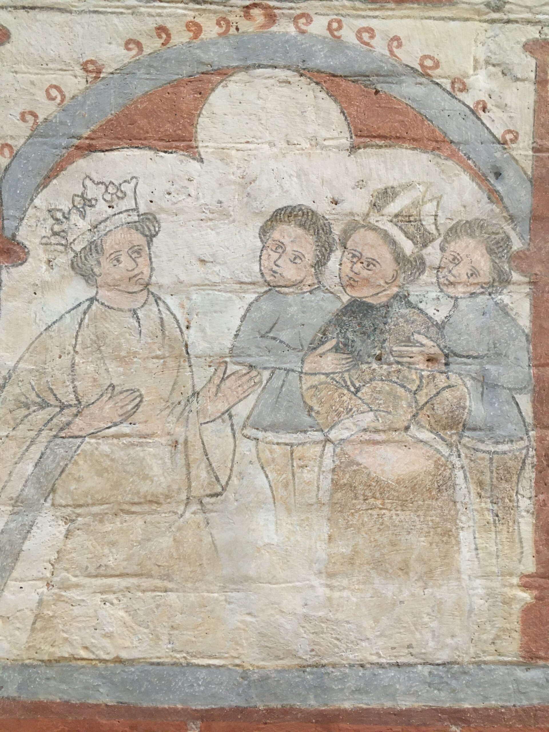 Medieval church painting where a king talks to a bishop, as well as two other men.