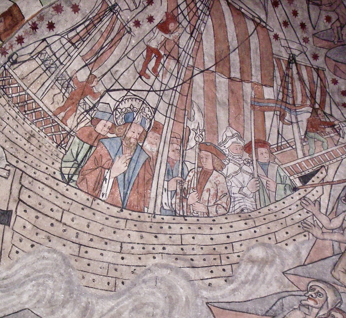 Bilden visar ett medeltida skepp med besättning och segel.
