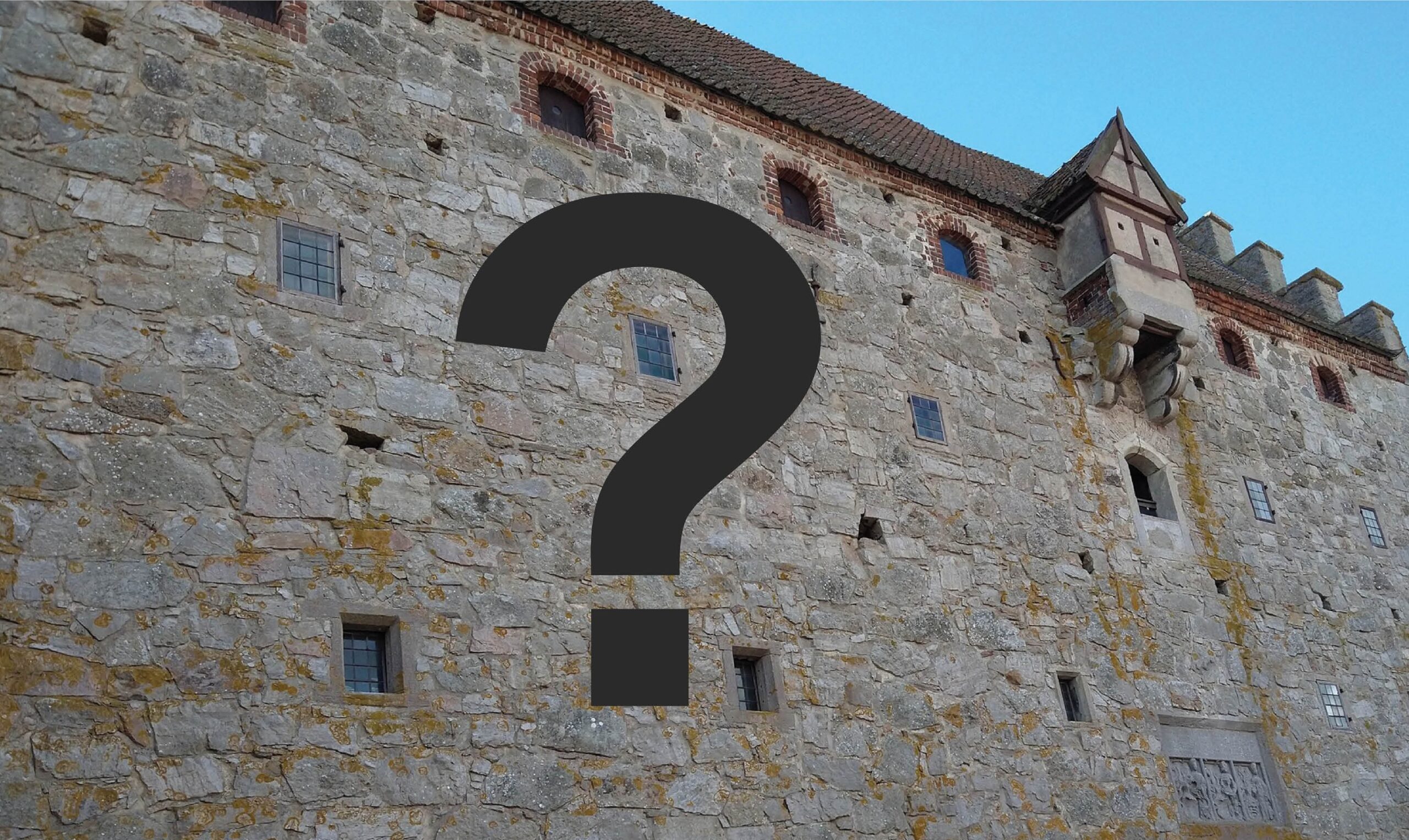 Ett frågetecken visas framför borgen.