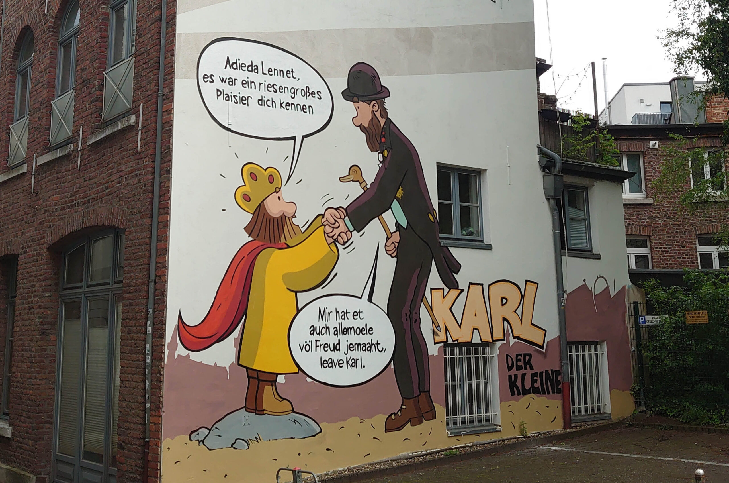 Bilden visar Karl den store som seriefigur på en husvägg.